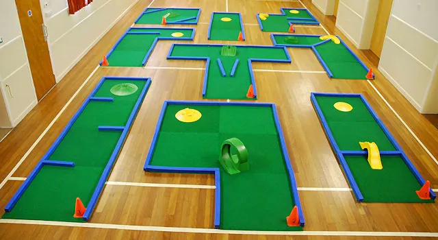 Portable crazy golf course set up at an event